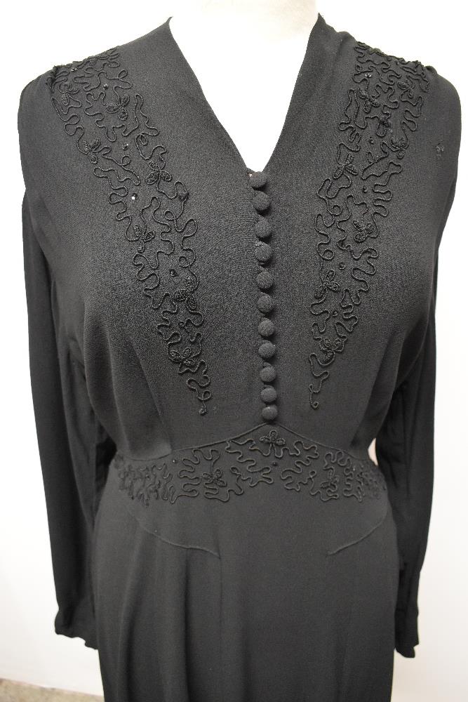 A late 1930s / 1940s black crepe day dress, having braiding to front with sequins, panelled skirt, - Image 6 of 8