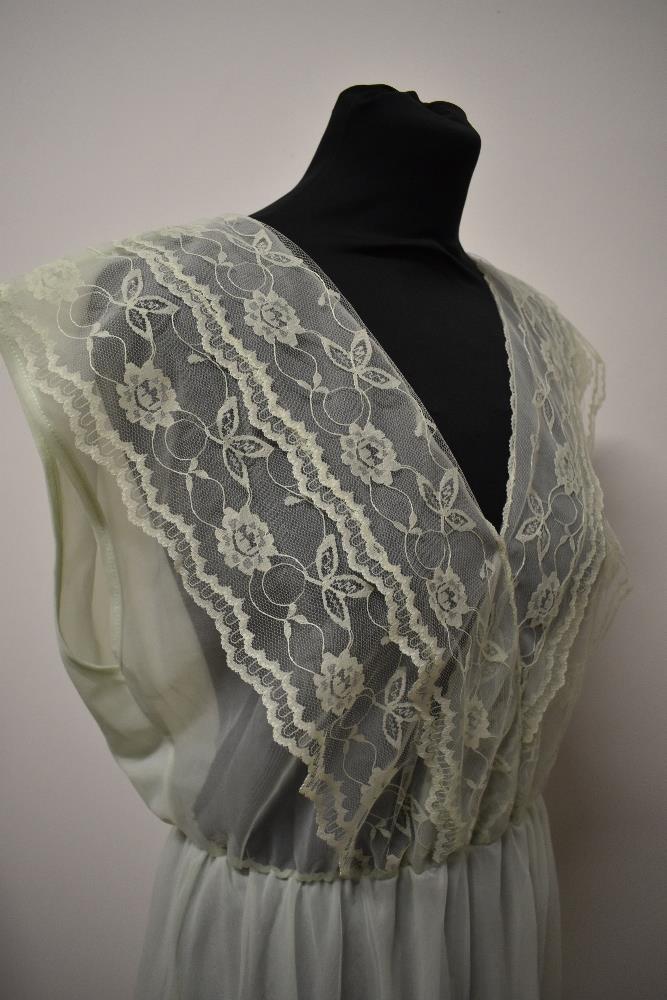 A vintage mint green nylon nightdress, having double layered skirt and floaty lace to bodice, - Image 5 of 6