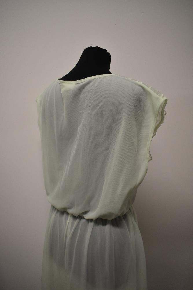 A vintage mint green nylon nightdress, having double layered skirt and floaty lace to bodice, - Image 6 of 6
