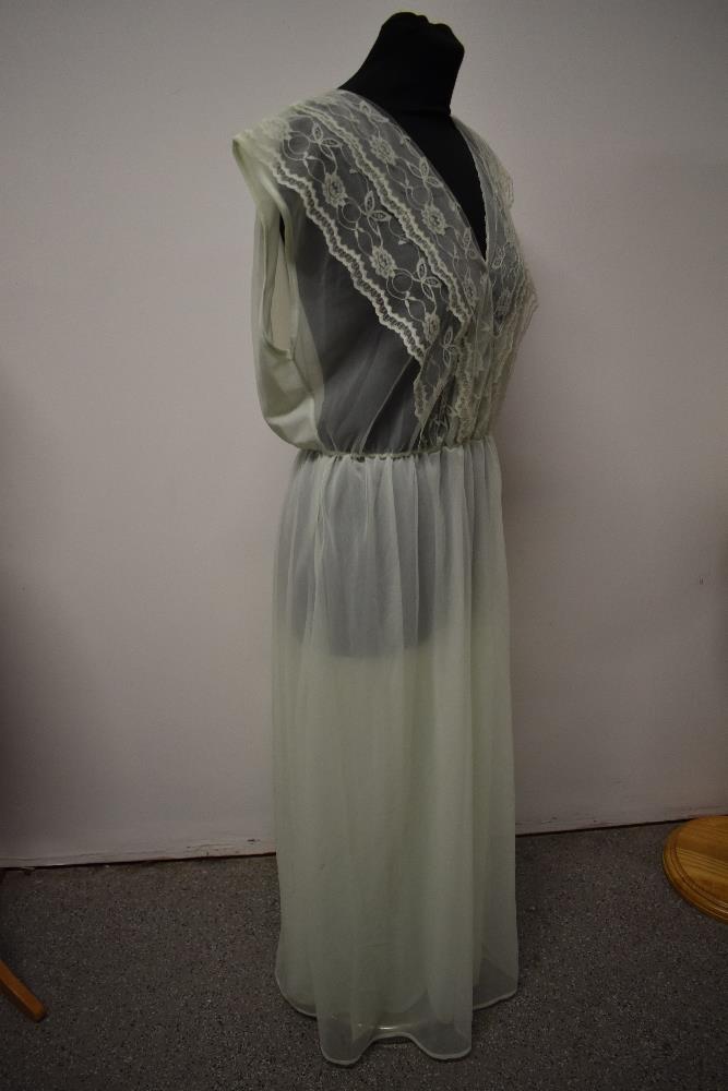 A vintage mint green nylon nightdress, having double layered skirt and floaty lace to bodice, - Image 4 of 6