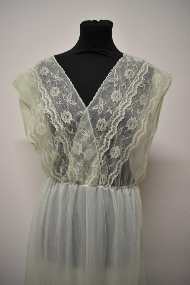 A vintage mint green nylon nightdress, having double layered skirt and floaty lace to bodice, - Image 2 of 6