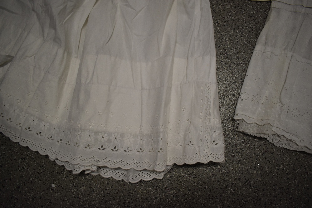 A large collection of Victorian to early 20th century petticoats and aprons, many with intricate - Image 3 of 12