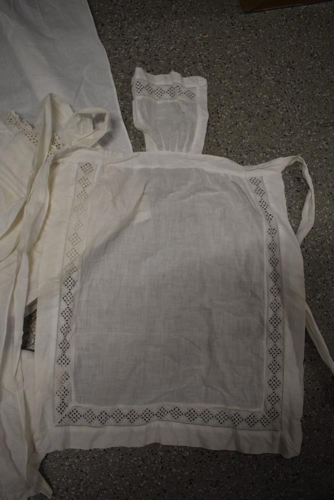 A large collection of Victorian to early 20th century petticoats and aprons, many with intricate - Image 12 of 12