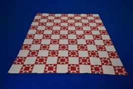 A beautiful late 19th/ early 20th century large hand stitched Durham quilt, having Ohio star