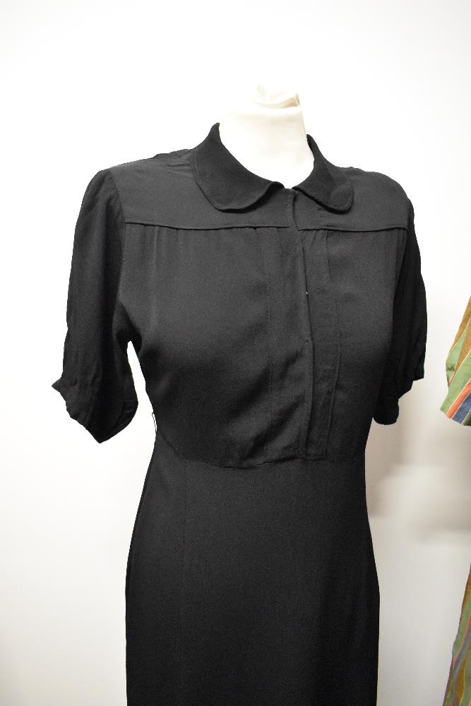 A vintage striped cotton day dress and a 1940s black crepe dress. - Image 3 of 4