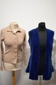 Two 1950s blouses, a 1950s cardigan (some historic moth damage) and a velvet waistcoat with label