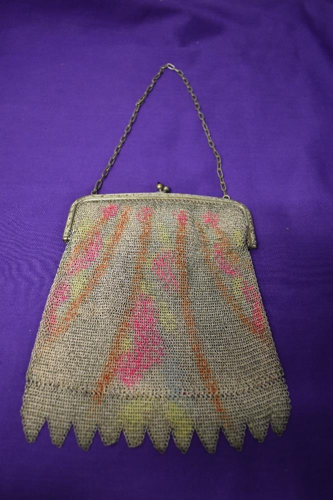 A 1920s painted mesh bag, having gem stones to clasp, chain handle and full lining.
