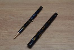 A Mabie Todd & Co Swan SM2/57 lever fill fountain pen and Fyne Point propelling pencil set in