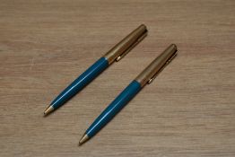 Two Parker 61 propelling pencils in turquoise with rolled gold caps