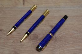A Parker Duofold MKII Centennial converter fill fountain pen, ballpoint pen, and propelling pencil