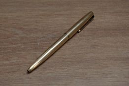A Parker rolled gold ballpoint pen. Engraved
