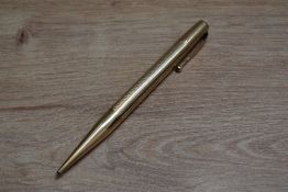 A Mabie Todd & Co Fyne Poynt propelling pencil in yellow metal. Engraved