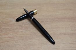 A Sheaffer Statesman snorkel fill fountain pen in black with broad band to white spot cap having