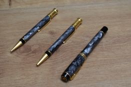 A Parker Duofold MKII Centennial converter fill fountain pen, ballpoint pen, and propelling pencil