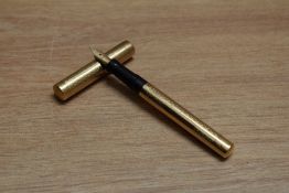 A Mabie Todd & Co Swan Lady eye dropper fountain pen in engine turned yellow metal having Swan 2