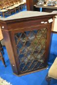 An Edwardian mahogany corner wall display cabinet , height approx 107cm