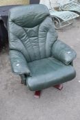 A green leather easy chair , Stressless style