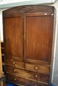 A 19th Century mahogany linen press having gentle arch cornice , and drawer base (two over two) ,