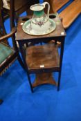 A Georgian mahogany night stand having later jug and bowl set