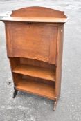 An Arts and Crafts oak bureau bookshelf , width approx 77cm