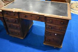 A Victorian pitch pine pedestal style desk, approx. 130 x 72cm