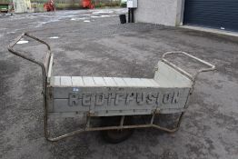 A vintage warehousing barrow, branded REDIFUSION
