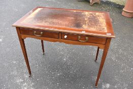 An Edwardian mahogany leather top writing table having two frieze drawers, width appprox 92, depth