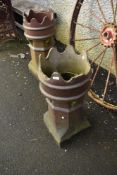 Two traditional chimney pots (af)
