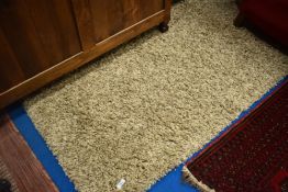 A modern wool large rug or carpet square , 300 x 240cm, in beige and brown flecks