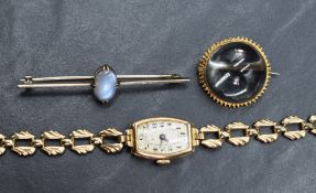 A 9ct gold vintage wrist watch having an Arabic numeral dial to canted rectangular face in a 9ct