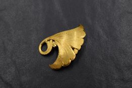 A 1960's Korean artisan made yellow metal brooch of petal design, bearing marks en verso, presumed