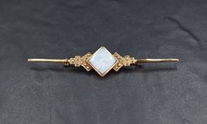 A 9ct gold bar brooch having a central square opal doublet, approx 83mm long & 7.3g