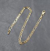 A 9ct gold figaro link bracelet, approx 1.8g