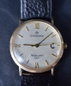 A 9ct gold wrist watch by Sovereign having Roman numeral and baton dial with date aperture to