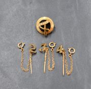 A 9ct gold Avon 'Highest Honour' brooch and three 9ct gold numerical stick pins, approx 5.7g total