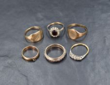A small selection of 9ct gold and yellow metal rings including signet, eternity, dress style etc,