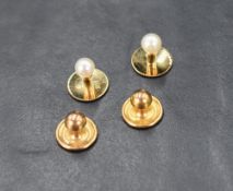 A pair of 14ct gold pearl set collar studs sold along with a pair of 9ct gold collar studs, 3.3g