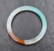 A tri coloured jade bangle, internal diameter approx 58mm