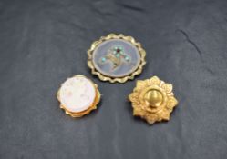 Three yellow metal brooches comprising a cameo depicting the Greek Goddess Selene in profile in a