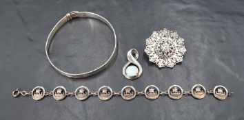 A small selection of silver and white metal jewellery including Ortak silver bracelet having nine
