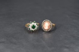 Two 9ct gold rings comprising a green and white paste cluster ring on a 9ct gold shank and a cameo