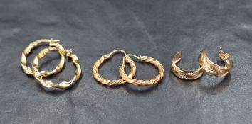 Three pairs of 9ct gold hoop earrings, two pairs of a twisted design and a pair of half-circle studs