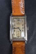 A gent's 1930's manual wind Omega tank cased wrist watch having Arabic numeral dial and subsidiary