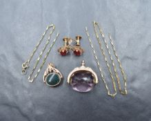 A small selection of 9ct gold jewellery including broken chain, two rose gold watch fobs and a