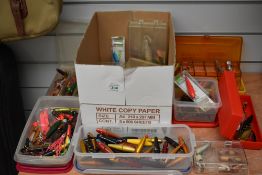 A large selection of fishing lures including flying Cs ,devon minnows, plugs and spoons in various