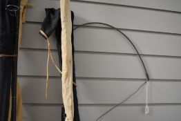 A greys of Alnwick (Hardy) split cane 2pc 9ft 6in Aln spinning rod in a soft sleeve