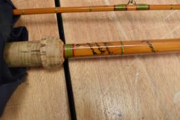 four Fishing rods An unmarked 3pc vintage cane rod A 2pc 7ft 6in graphite fly rod and a Ryobi 2pc