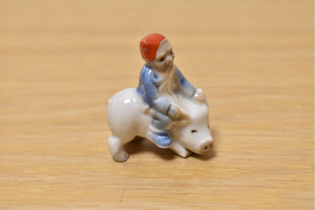A scarce wade whimsie, depicting tiny elf riding a pig. - Image 1 of 3