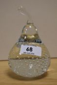 A 20th Century clear or Flint art glass paperweight, in the form of a pear with controlled bubble