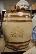 A Victorian Doulton and Watts glazed stoneware spirit barrel, having Royal cipher with lion and